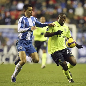 Yakubu vs. Scharner: Intense Clash Between Wigan and Everton in Barclays Premier League