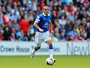 Season 2013-14 Prints: 0-0 Battle at Cardiff City Stadium: Osman's Leading Role in Scoreless Everton Performance (Barclays Premier League)