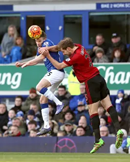 Aerial Clash: Cleverley vs. Dawson at Goodison Park - Everton vs. West Bromwich Albion