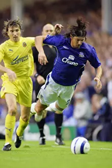 Alessandro Pistone Prints: Alessandro Pistone: Down but Not Out in Everton's Champions League Battle