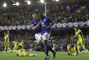 Images Dated 24th August 2011: Anichebe and Barkley's Unlikely Celebration: Sheffield United's Own Goal Secures Everton's Carling