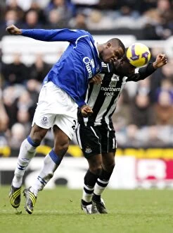Images Dated 22nd February 2009: Anichebe vs Bassong: Everton vs Newcastle United - Barclays Premier League Clash at St James Park