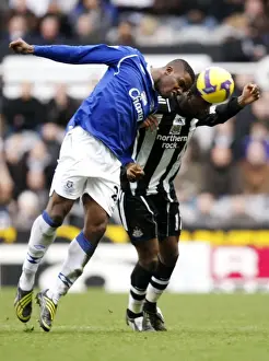Newcastle V Everton Prints: Anichebe vs Bassong: Everton vs Newcastle United - Barclays Premier League Clash at St James Park
