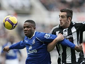 Images Dated 22nd February 2009: Anichebe vs Enrique: A Fierce Battle at St. James Park - Newcastle United vs Everton