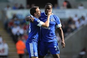 Images Dated 22nd September 2012: Anichebe's Triumph: Everton's Victor Anichebe Celebrates Goal with Seamus Coleman in 3-0 Victory