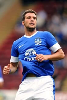 Images Dated 21st July 2012: Apostolos Vellios in Action: Motherwell vs. Everton Pre-Season Friendly at Fir Park Stadium