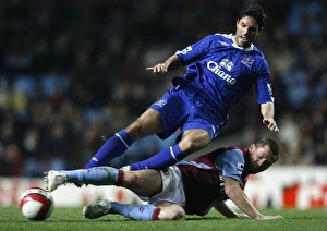 Images Dated 2nd April 2007: Aston Villas Bardsley challenges Evertons Arteta for the ball during their English Premier League