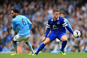 Season 2013-14 Prints: Barkley vs Lescott: Clash at Etihad Stadium - Manchester City vs Everton