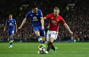 Soccer Football Prints: Barry vs Shaw: Intense Battle for Ball Possession - Manchester United vs Everton