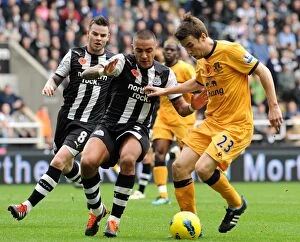 Images Dated 5th November 2011: Battle for the Ball: Coleman vs. Simpson - Newcastle United vs