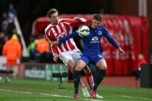 Images Dated 4th March 2015: Battle for the Ball: Crouch vs. Stones - Everton vs. Stoke City, Premier League