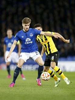 Framed Print : A Battle for the Ball: Everton vs BSC Young Boys - UEFA Europa League Round of 32, Goodison Park