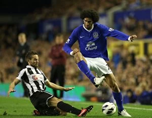 Images Dated 17th September 2012: Battle for the Ball: Fellaini vs. Cabaye - Everton vs. Newcastle United