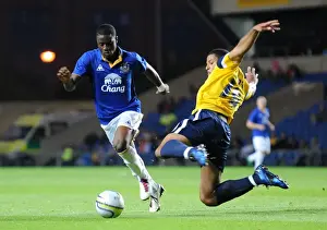 Framed Print : Battle for the Ball: Femi Oregbiru of Everton and Ryan James of Oxford United Clash in Pre-Season Friendly (2011) Framed Print : Battle for the Ball: Femi Oregbiru of Everton and Ryan James of Oxford United Clash in Pre-Season Friendly (2011)
