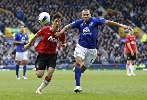 29 October 2011, Everton V Manchester United Prints: Battle for the Ball: Heitinga vs. Park - Everton vs. Manchester United Clash (BPL 2011)