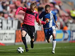 30 April 2011 Wigan Athletic V Everton Prints: Battle for the Ball: Hibbert vs. Cleverley - Premier League Rivalry (April 2011)