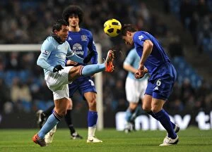 20 December 2010 Manchester City v Everton Collection: Battle for the Ball: Jagielka vs Tevez - Manchester Derby Intensity (Manchester City vs Everton)