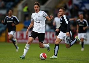 Images Dated 28th July 2015: Battle for the Ball: Kieran Dowell vs. Andy Black - Everton's Pre-Season Clash at Dundee