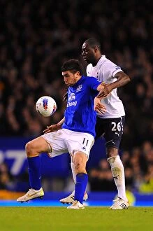 Images Dated 10th March 2012: Battle for the Ball: King vs. Stracqualursi - Everton vs. Tottenham Hotspur