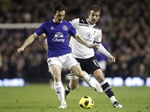 05 January 2011 Everton v Tottenham Hotspur Collection: Battle for the Ball: Leighton Baines vs. Rafael van der Vaart - Everton vs