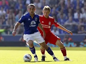 Battle for the Ball: Leiva vs. Osman in the Merseyside Derby (01 October 2011)
