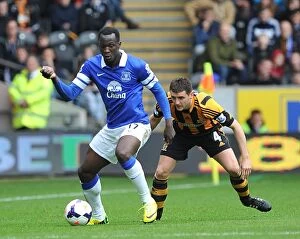 Images Dated 11th May 2014: Battle for the Ball: Lukaku's Triumph over Bruce in Everton's Victory against Hull City (11-05-2014)