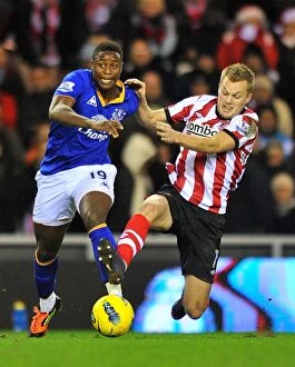 Images Dated 26th December 2011: Battle for the Ball: Magaye Gueye vs. Sebastian Larsson - Everton vs