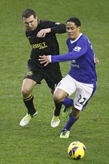 Images Dated 26th December 2012: Battle for the Ball: McArthur vs. Pienaar - Everton vs. Wigan Athletic (26-12-2012)
