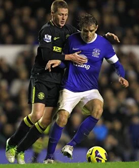 Images Dated 26th December 2012: Battle for the Ball: McCarthy vs. Jelavic at Goodison Park - Everton vs