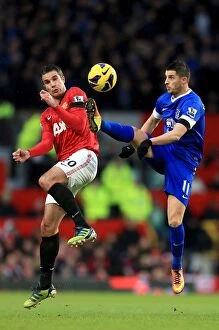 Images Dated 10th February 2013: Battle for the Ball: Mirallas vs. van Persie - Manchester United vs. Everton (2-0) at Old Trafford