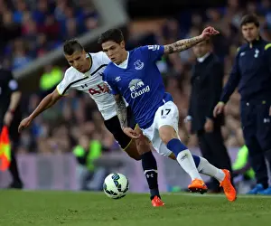 Battle for the Ball: Muhamed Besic vs. Erik Lamela - Everton vs. Tottenham Rivalry at Goodison Park