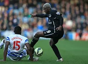 Queens Park Rangers V Everton - Loftus Road Prints: Battle for the Ball: Onuoha vs. Kone - Queens Park Rangers vs. Everton
