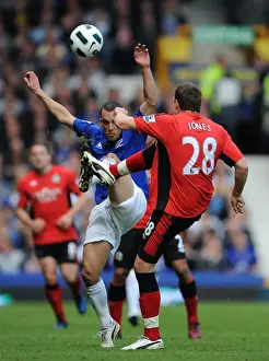 Framed Print : Battle for the Ball: Osman vs Jones - Everton vs Blackburn Rovers, Premier League (2011) Framed Print : Battle for the Ball: Osman vs Jones - Everton vs Blackburn Rovers, Premier League (2011)