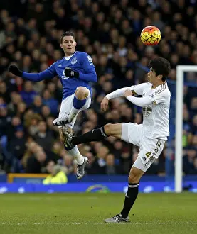 Framed Print : Battle for the Ball: Oviedo vs Ki at Goodison Park - Everton vs Swansea City Framed Print : Battle for the Ball: Oviedo vs Ki at Goodison Park - Everton vs Swansea City