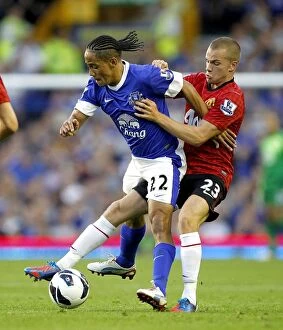 Everton 1 v Manchester United 0 : Goodison Park: 20-08-2012 Collection: Battle for the Ball: Pienaar vs. Cleverley - Everton's 1-0 Victory over Manchester United