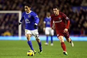 Images Dated 30th January 2013: Battle for the Ball: Pienaar vs Dorrans at Goodison Park - Everton vs West Bromwich Albion