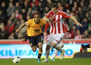 Images Dated 1st May 2012: Battle for the Ball: Pienaar vs Huth - Everton vs Stoke City Rivalry (01 May 2012)