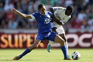 Images Dated 22nd September 2012: Battle for the Ball: Pienaar's Triumph over Dyer - Everton's Dominance over Swansea City (3-0)