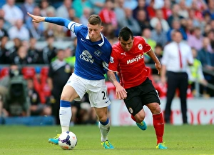 Season 2013-14 Prints: Battle for the Ball: Ross Barkley vs Gary Medel - A Premier League Clash at Cardiff City (31-08-2013)