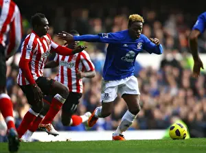 Framed Print : Battle for the Ball: Saha vs Mensah - Everton vs Sunderland's Intense Rivalry (Barclays Premier League, 26 February 2011) Framed Print : Battle for the Ball: Saha vs Mensah - Everton vs Sunderland's Intense Rivalry (Barclays Premier League, 26 February 2011)