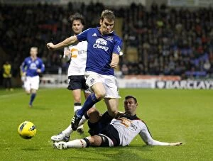Images Dated 26th November 2011: Battle for the Ball: Seamus Coleman vs. Paul Robinson - Everton vs