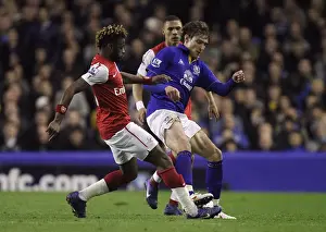 21 March 2012 V Arsenal, Goodison Park Prints: Battle for the Ball: Song vs. Jelavic at Goodison Park - Everton vs