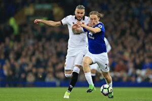 Images Dated 12th May 2017: Battle for the Ball: Tom Davies vs. Valon Behrami - Everton vs