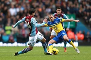 Images Dated 26th October 2013: Battle for the Ball: Tonev vs. Osman in Aston Villa vs. Everton's Intense Premier League Clash at