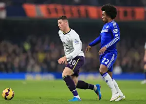 Battle for the Ball: Willian vs. Barkley - Premier League Rivalry Unfolds at Stamford Bridge