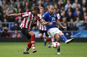 Framed Print : Battle for the FA Cup: Heitinga vs Campbell - Everton vs Sunderland (Round 6, Goodison Park, 17 March 2012) Framed Print : Battle for the FA Cup: Heitinga vs Campbell - Everton vs Sunderland (Round 6, Goodison Park, 17 March 2012)