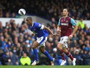 Everton 2 V West Ham United 0 : Goodison Park : 12-05-2013 Prints: Battle at Goodison Park: Distin vs. Carroll - Everton vs. West Ham United (12-05-2013)