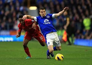 Images Dated 28th October 2012: Battle at Goodison Park: Everton vs. Liverpool - Sterling vs. Coleman: A Riveting Rivalry (2012)