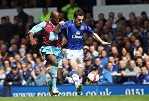 Images Dated 16th May 2009: Battle at Goodison Park: Leighton Baines vs. Luis Boa Morte - Everton vs