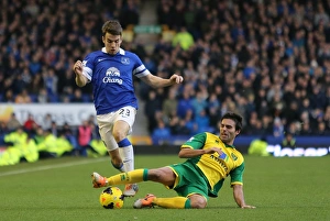Everton 2 V Norwich City 0 : Goodison Park : 11-01-2014 Prints: Battle at Goodison Park: Seamus Coleman vs Javier Garrido